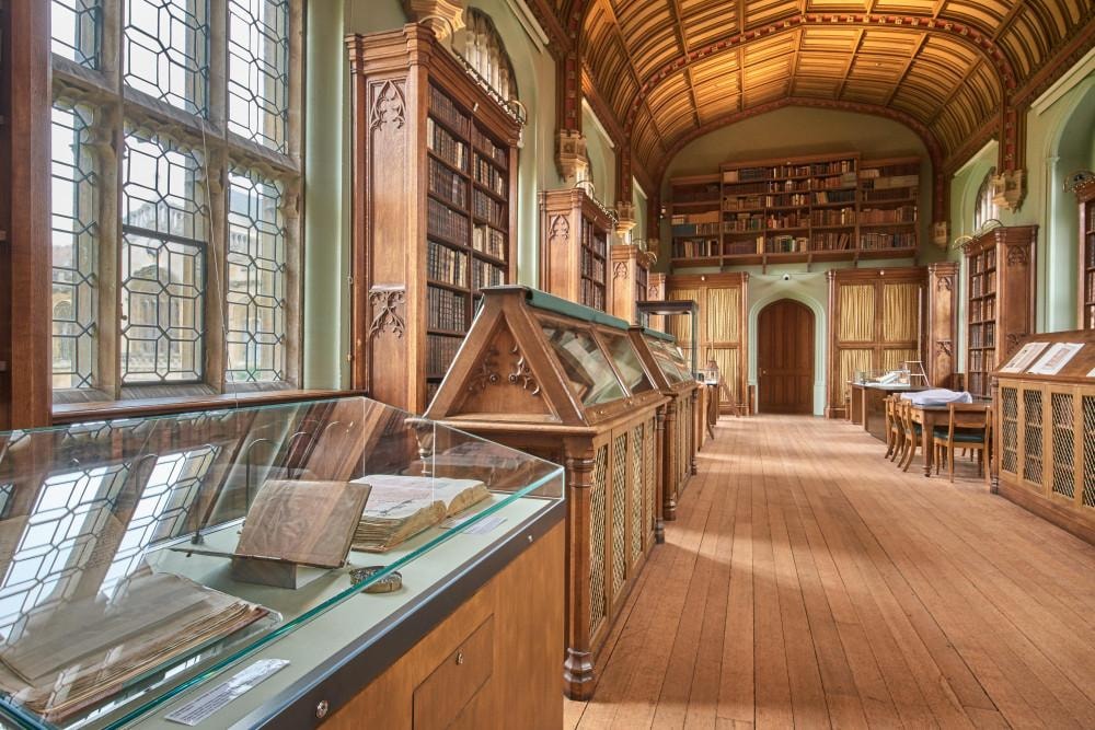 Elegant private library study with warm lamp light
